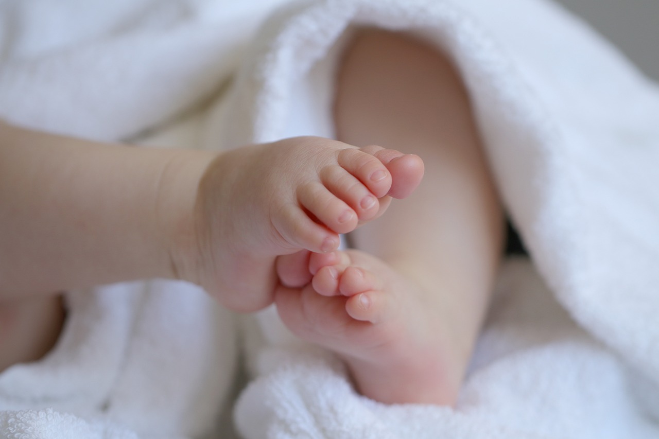 Baby's feet resting together